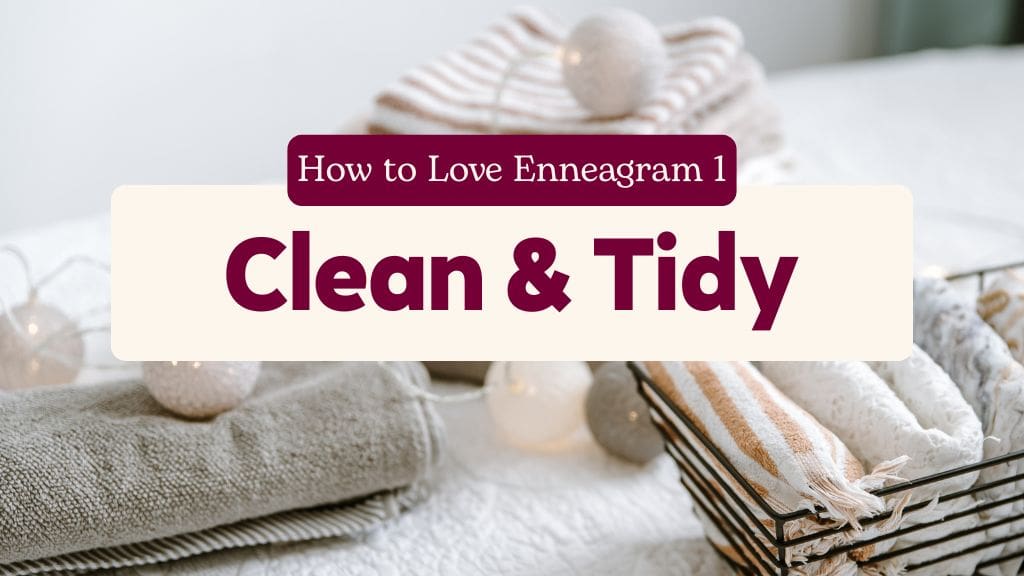 Neatly folded towels and linens with text ‘How to Love Enneagram 1: Clean and Tidy.