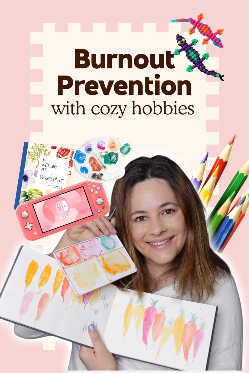 Featured image reading “Burnout Prevention with cozy hobbies,” showing a smiling woman holding a watercolor palette and sketchbook of painted carrots, surrounded by art supplies, colored pencils, a watercolor set, and a handheld game console on a pink background.