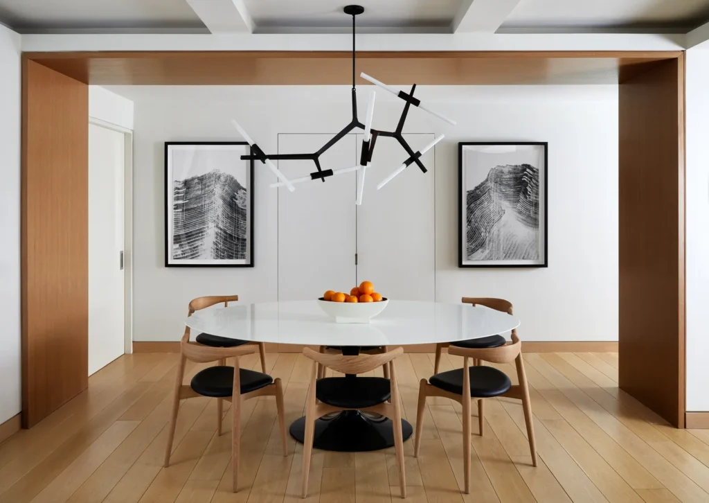 Minimalist dining room with clean lines representing Enneagram One interior design style